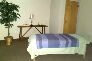 Image: Massage Therapy Room - A glimpse into the serene massage therapy room at Seasons Chiropractic, designed for relaxation, healing, and specialized treatments for car accident injuries.